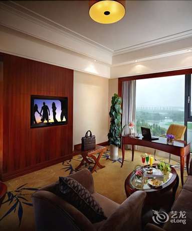 Imagen de la habitación del Hotel New Century Grand Hotel Huaian. Foto 8