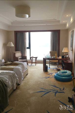 Imagen de la habitación del Hotel New Century Grand Hotel Huaian. Foto 9