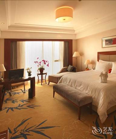 Imagen de la habitación del Hotel New Century Grand Hotel Huaian. Foto 11
