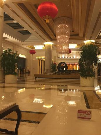 Imagen de la habitación del Hotel New Century Grand Hotel Huaian. Foto 12