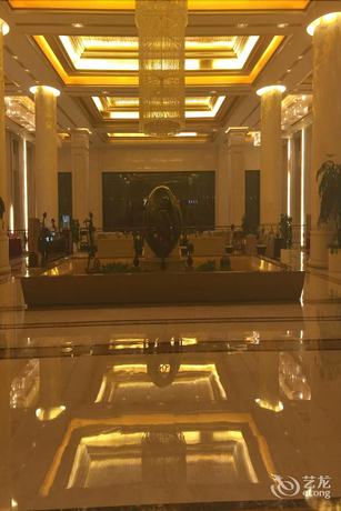 Imagen de la habitación del Hotel New Century Grand Hotel Huaian. Foto 13