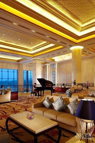 Imagen de la habitación del Hotel New Century Grand Hotel Huaian. Foto 14
