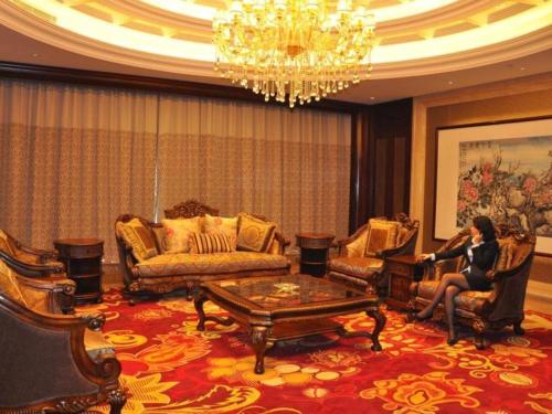 Imagen general del Hotel New Century Grand Hotel Zhejiang Sanli. Foto 4