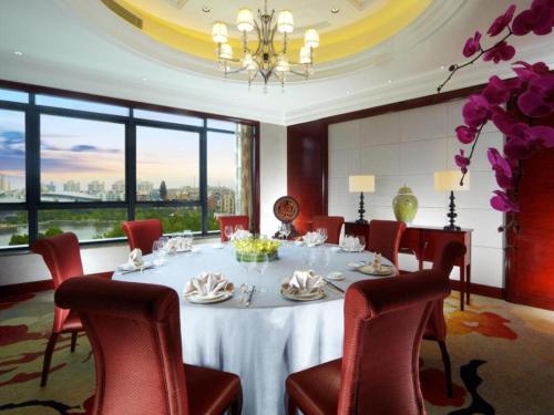 Imagen general del Hotel New Century Grand Hotel Zhejiang Sanli. Foto 9