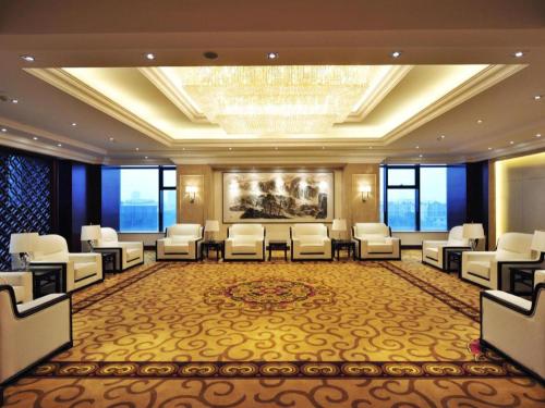 Imagen general del Hotel New Century Grand Hotel Zhejiang Sanli. Foto 12