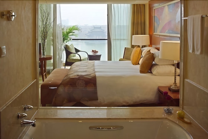 Imagen de la habitación del Hotel New Century Grand Kaifeng. Foto 6