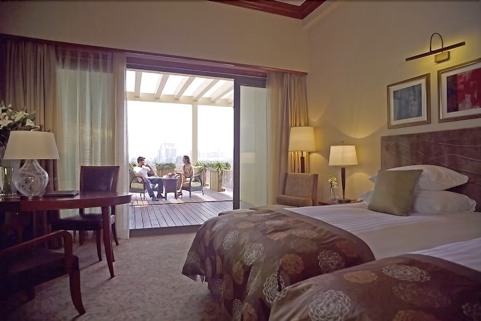 Imagen de la habitación del Hotel New Century Grand Kaifeng. Foto 7