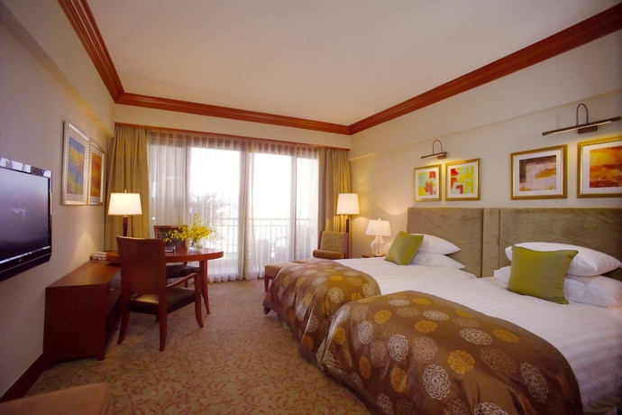 Imagen de la habitación del Hotel New Century Grand Kaifeng. Foto 8