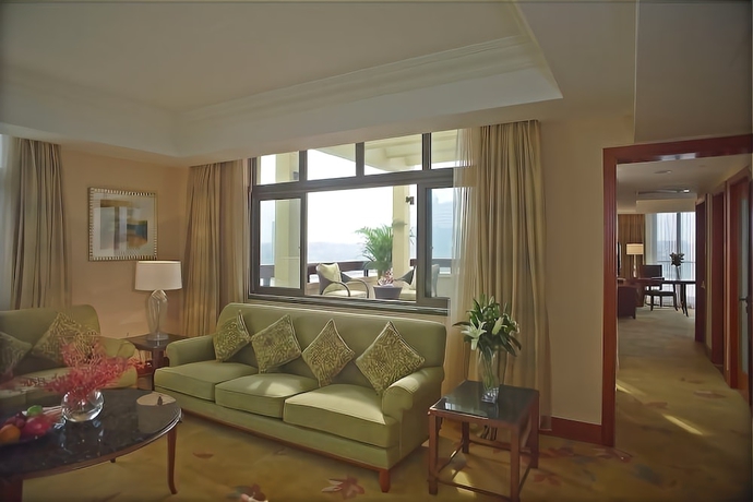 Imagen de la habitación del Hotel New Century Grand Kaifeng. Foto 10