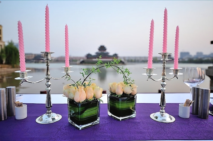 Imagen del bar/restaurante del Hotel New Century Grand Kaifeng. Foto 3