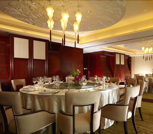 Imagen del bar/restaurante del Hotel New Century Grand Tonglu Hangzhou China. Foto 3