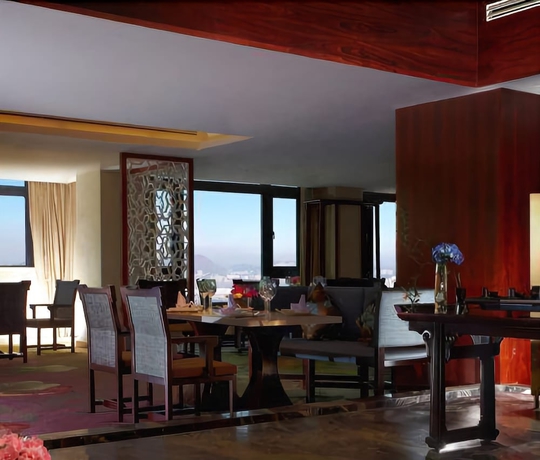 Imagen del bar/restaurante del Hotel New Century Grand Tonglu Hangzhou China. Foto 4