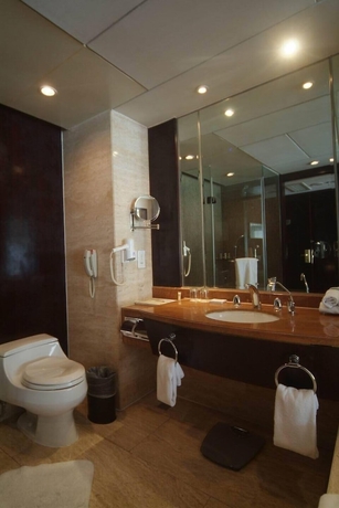 Imagen de la habitación del Hotel New Century Grand Xuzhou. Foto 12