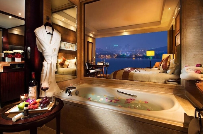 Imagen de la habitación del Hotel New Century Grand Xuzhou. Foto 13
