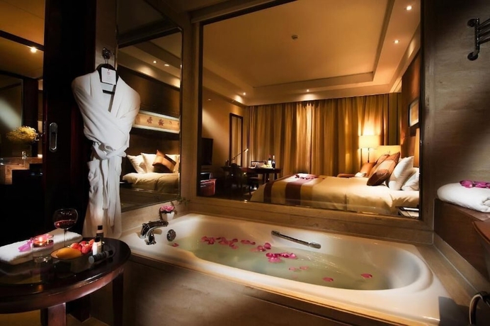 Imagen de la habitación del Hotel New Century Grand Xuzhou. Foto 14