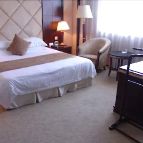 Imagen de la habitación del Hotel New Century Hotel Taizhou. Foto 4