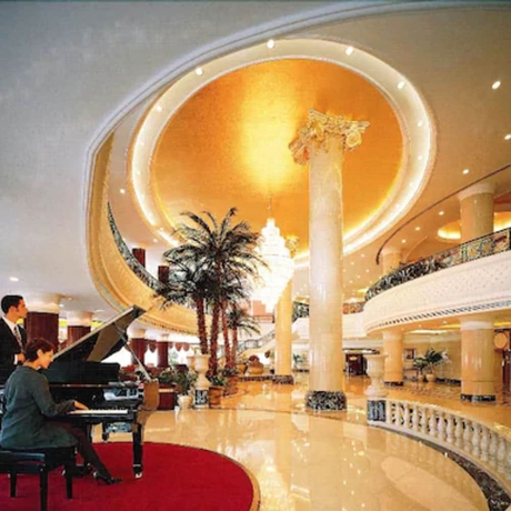 Imagen de los interiores del Hotel New Century Hotel Taizhou. Foto 17