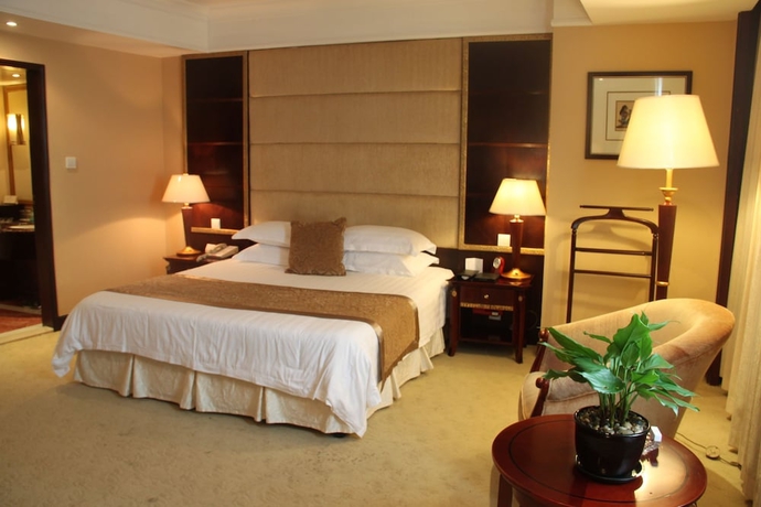 Imagen de la habitación del Hotel New Century Hotel Taizhou. Foto 9