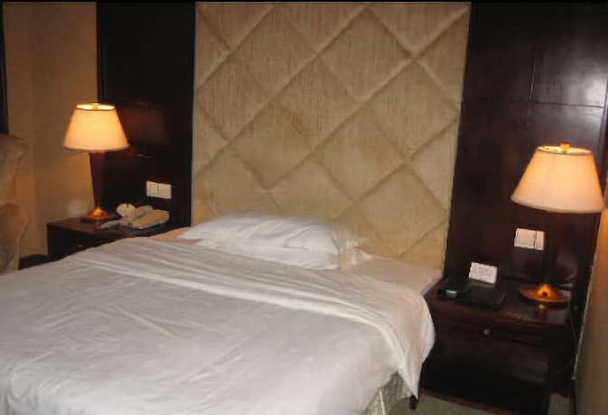 Imagen de la habitación del Hotel New Century Hotel Taizhou. Foto 11