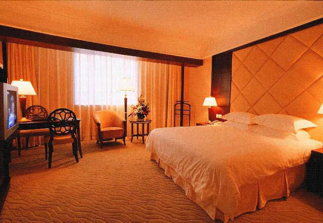 Imagen de la habitación del Hotel New Century Hotel Taizhou. Foto 14