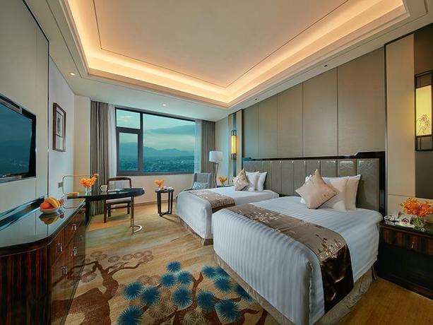 Imagen de la habitación del Hotel New Century Hotel Tiantai Zhejiang. Foto 3