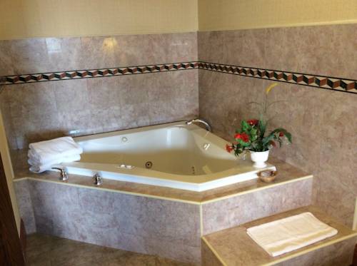 Imagen de la habitación del Hotel New Century Inn. Foto 5