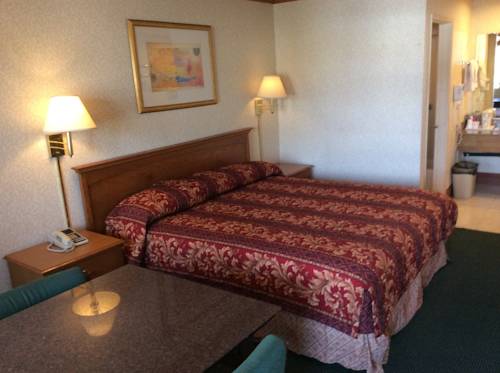 Imagen de la habitación del Hotel New Century Inn. Foto 9