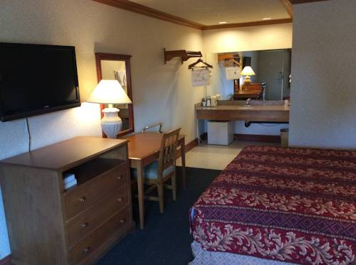 Imagen de la habitación del Hotel New Century Inn. Foto 11
