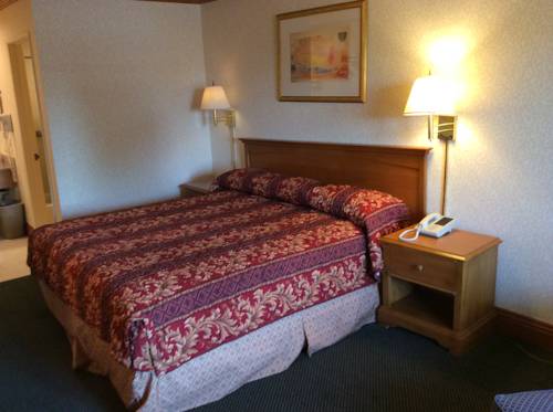 Imagen de la habitación del Hotel New Century Inn. Foto 13