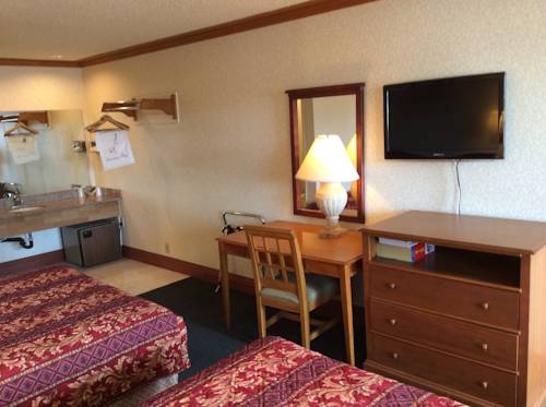 Imagen de la habitación del Hotel New Century Inn. Foto 14
