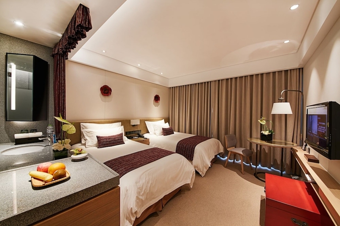 Imagen de la habitación del Hotel New Century Kylie Ningbo. Foto 2
