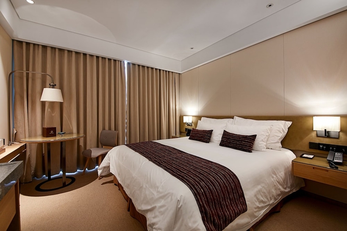 Imagen de la habitación del Hotel New Century Kylie Ningbo. Foto 4