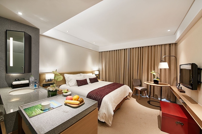 Imagen de la habitación del Hotel New Century Kylie Ningbo. Foto 6