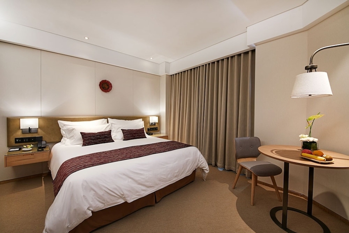 Imagen de la habitación del Hotel New Century Kylie Ningbo. Foto 7
