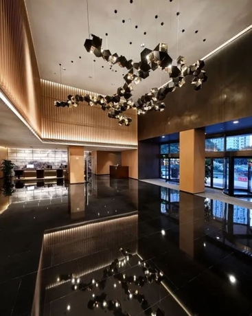 Imagen de los interiores del Hotel New Century Kylie Ningbo. Foto 16