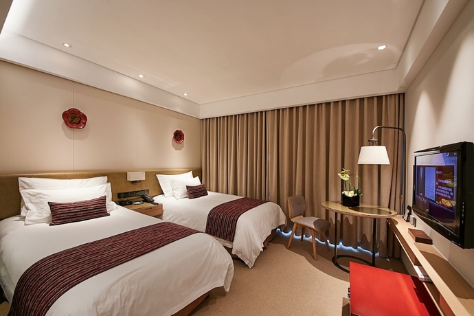 Imagen de la habitación del Hotel New Century Kylie Ningbo. Foto 8