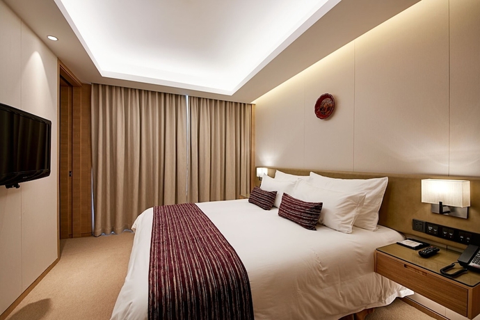 Imagen de la habitación del Hotel New Century Kylie Ningbo. Foto 9