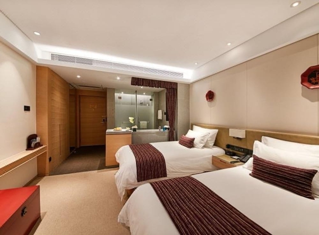 Imagen de la habitación del Hotel New Century Kylie Ningbo. Foto 11