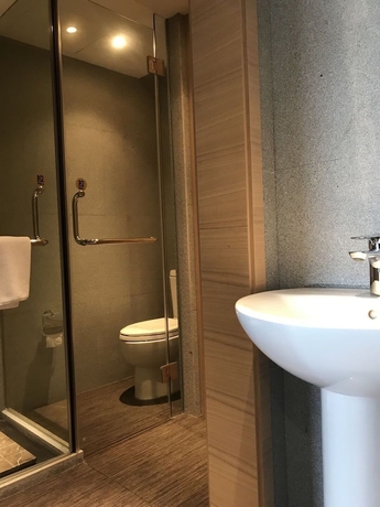 Imagen de la habitación del Hotel New Century Kylie Ningbo. Foto 13