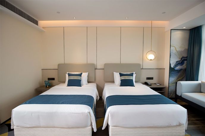Imagen de la habitación del Hotel New Century Life Changchun. Foto 5