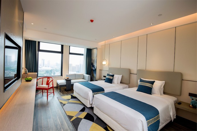Imagen de la habitación del Hotel New Century Life Changchun. Foto 6