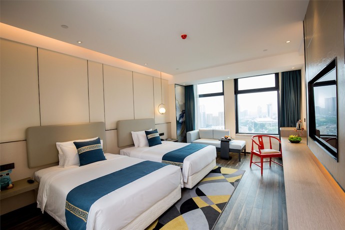 Imagen de la habitación del Hotel New Century Life Changchun. Foto 7