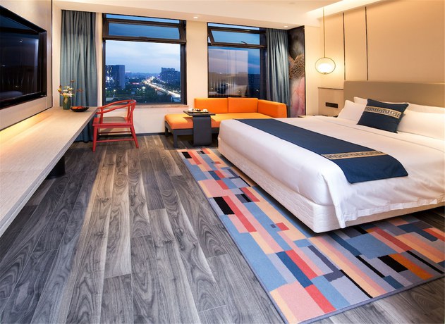 Imagen de la habitación del Hotel New Century Life Changchun. Foto 8
