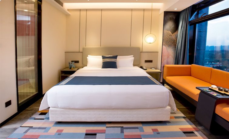 Imagen de la habitación del Hotel New Century Life Changchun. Foto 9