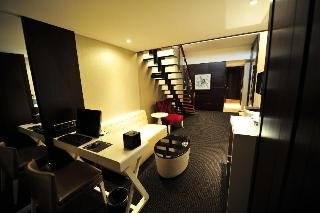 Imagen de la habitación del Hotel New Century ManJu. Foto 9