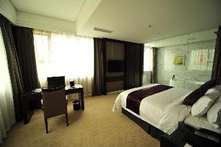 Imagen de la habitación del Hotel New Century ManJu. Foto 10