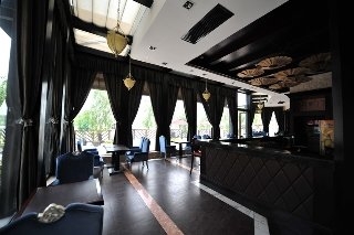 Imagen del bar/restaurante del Hotel New Century ManJu. Foto 7