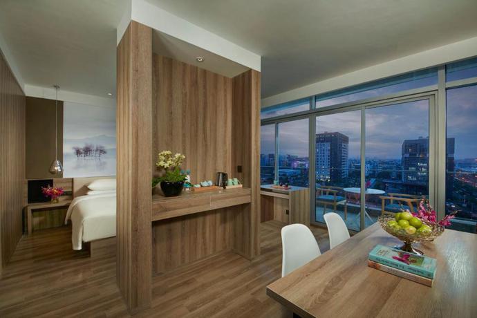 Imagen de la habitación del Hotel New Century Manju Hotel Wanda Plaza Minhang. Foto 4