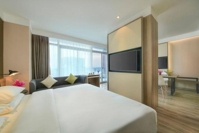 Imagen de la habitación del Hotel New Century Manju Hotel Wanda Plaza Minhang. Foto 6