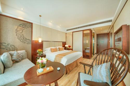 Imagen de la habitación del Hotel New Century Manju Liangzhu Hangzhou. Foto 6